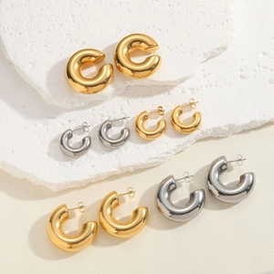 Minimalist C-shape titanium steel hoop earrings set in polished gold and silver finishes