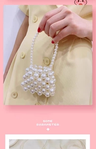 Detailed view of the handcrafted white faux pearl beaded mini bag with a pearl handle
