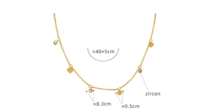 Detail of gold heart pendant necklace with zircon charm and 40+5cm chain measurements