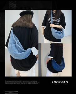 Three perspectives of a large capacity denim crossbody bag with crescent moon design