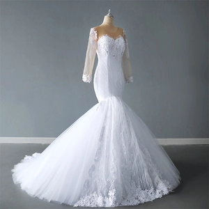 Elegant white lace long sleeve mermaid wedding dress with sequins and a sheer tulle train