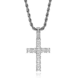 Macro shot of micro-paved zircon stones on a solid hip hop cross pendant with twist chain