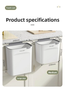 Detail view of wall-mounted kitchen trash can in two sizes on white cabinet door