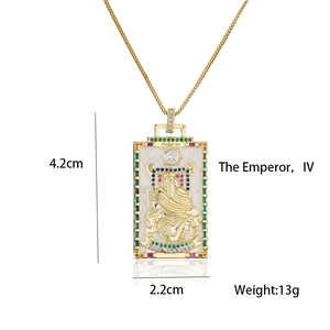 Detail of 18K gold tarot necklace The Emperor with colorful gemstones and 4.2cm size