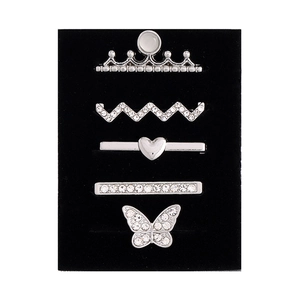 Detailed view of silver-tone rhinestone decorative charms set for silicone watch bands