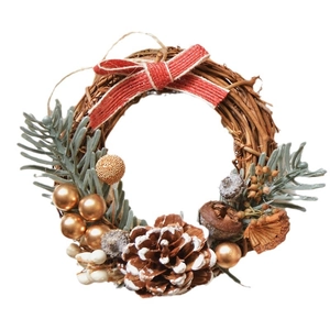 Brown rattan Christmas wreath with red linen bow, pine cones and gold berry accents