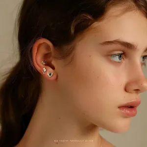 Elegant S925 sterling silver animal and heart stud earrings with black zircon on model