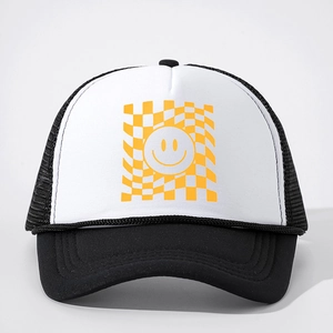 Trucker hat with black white panel, yellow checkered smiley face and mesh back design
