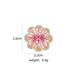 Detail of flower brooch with pink cubic zirconia petals and 2.0cm x 2.2cm dimensions