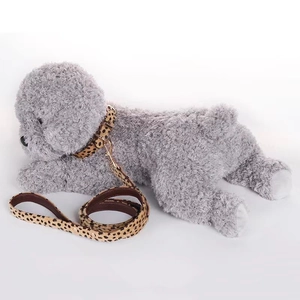 Close-up of leopard print pony hair dog collar and leash set with durable metal buckle