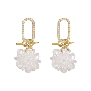 Elegant gold flower earrings with pearls and crystals for women on white background