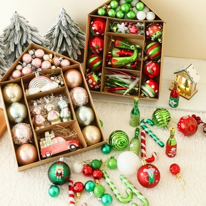 Festive Christmas tree ornament set featuring colorful balls and unique shapes in gift box