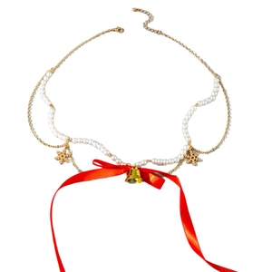 Christmas velvet choker necklace with red bow, gold bell, and snowflake charms