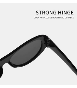 Detail of strong metal hinge on black oval sunglasses for smooth and durable opening