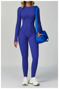 Detail of royal blue long sleeve yoga jumpsuit with corset style stitching lines