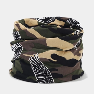 Close-up of jungle camouflage knit neck gaiter with white eagle wing graphic print