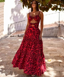 Detail of red and purple abstract print cutout maxi dress with layered ruffled skirt