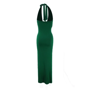Rear view of elegant green halter maxi dress with backless design and sleek silhouette