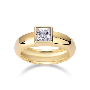 Macro shot of 18K gold bezel set square moissanite ring with polished wide band