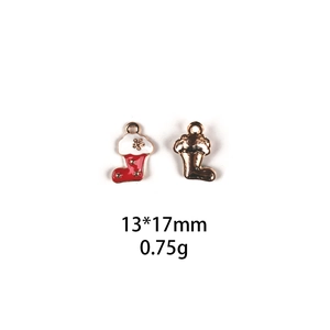 Detailed view of red and white Christmas stocking DIY charms with size 13x17mm measurement