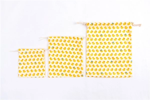 Three sizes of cotton linen drawstring bags with yellow duck prints for storage