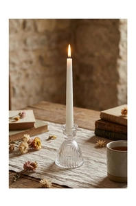 Macro shot of vertical ribbed glass candle holder with elegant ruffled edge detail