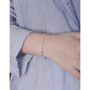Minimalist S925 sterling silver bar and bead link bracelet worn on a female wrist
