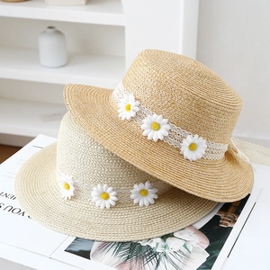 Flat top straw sun hats with lace band and white daisy flowers for beach vacation