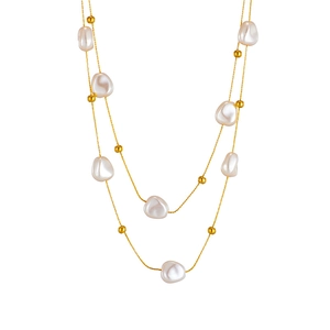 Baroque pearl double-layer titanium steel necklace in gold finish on white background