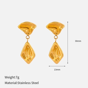 Detailed view of gold irregular lava earrings in stainless steel with dimensions and weight