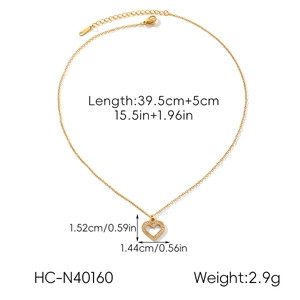 Detail view of gold heart pendant dimensions with measurement labels on white background