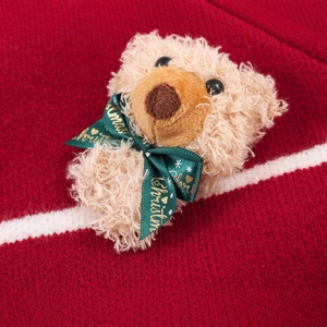 Red Christmas knit cardigan with a beige teddy bear ornament and gold lettering