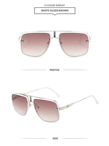 Close-up of white silver double bridge sunglasses with brown gradient lenses