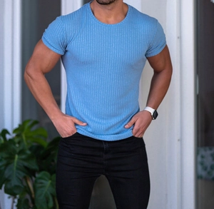 Detailed view of light blue slim fit t-shirt featuring textured vertical ribbed fabric