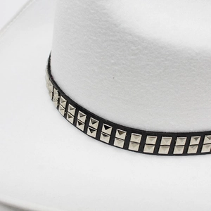 Detail of white wool felt hat featuring a black band with double rows of silver studs