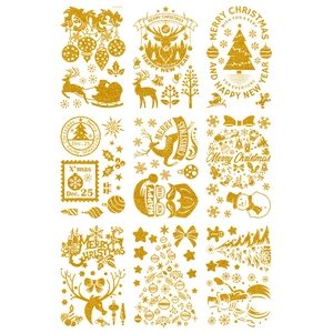 Detail of glitter gold Christmas window stickers featuring Santa Claus and reindeer sets