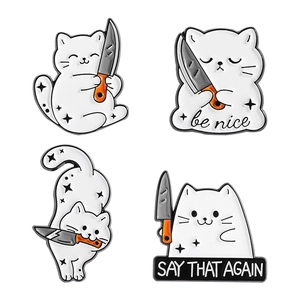 Funny white cat enamel pin set with knives and text badges in a 2x2 grid layout