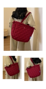 Détail du grand sac cabas matelassé bordeaux avec surpiqûres en losanges