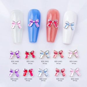 Nœuds métalliques 9x7mm pour nail art avec finition émail en diverses couleurs vives