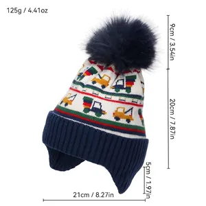 Winter knit hat for boys with vehicle patterns, fleece lining, and blue pompom detail