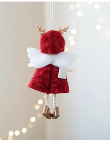 Detail of felt Christmas angel ornament with deer antlers and red knitted clothes