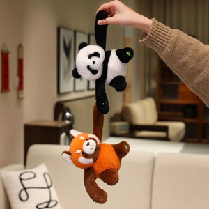 Cute panda and red panda plush toys with long magnetic arms in a cozy living room setting