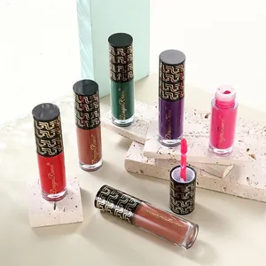 Set of six matte liquid lipsticks in diverse shades on white textured stones