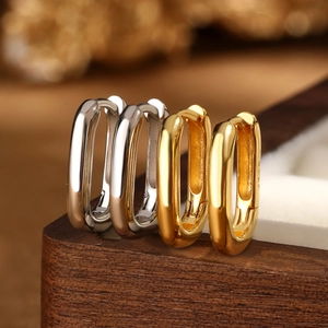 Minimalist S925 sterling silver oval hoop earrings in polished gold and silver finishes