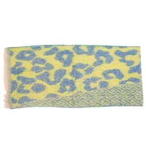 Detailed view of yellow and blue leopard print scarf with soft fringe and geometric patterns