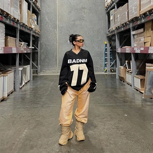 Street style oversized V-neck jersey set with black BADNM 77 print and khaki cargo pants