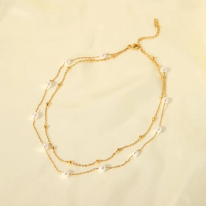 Double-layered 18K gold plated stainless steel necklace with elegant white pearls and gold beads