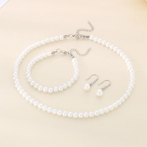 Three-piece stainless steel white pearl jewelry set including necklace, bracelet and earrings
