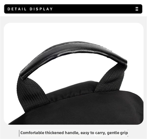 Detail display of the reinforced padded carry handle on this men's Oxford fabric chest bag