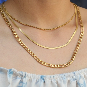 Three-layer gold stainless steel necklace set with rope, snake and figaro chains